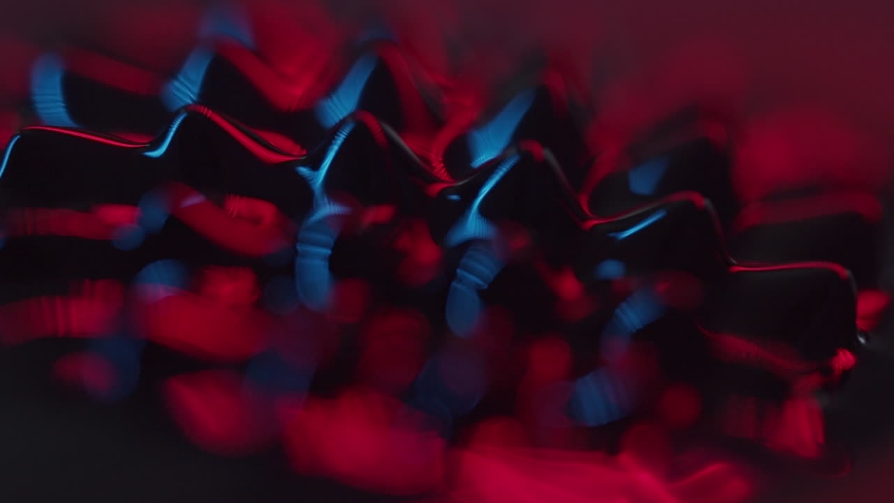 fluid forming spikes in a dark abstract atmosphere