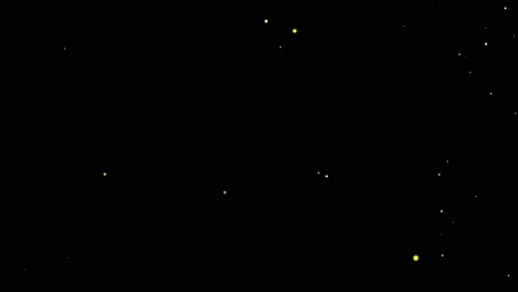 golden glitter sparkling magic light shining gold dust particles trail crossing sparkles on black