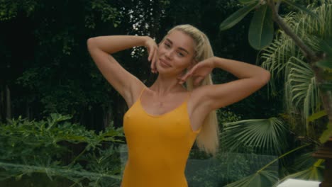 woman in yellow swimsuit, tropical location