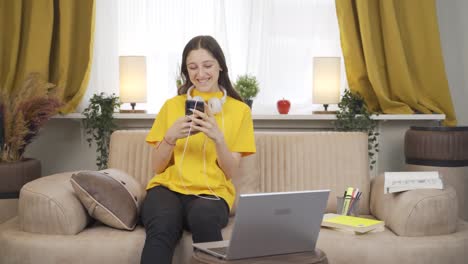 Female-student-chatting-on-the-phone.