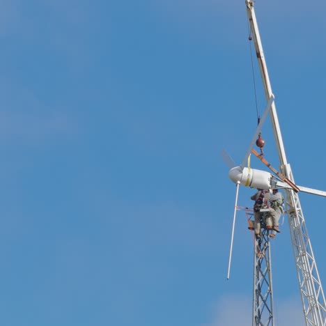 Dangerous-Profession---Two-Men-Working-On-A-Wind-Turbine