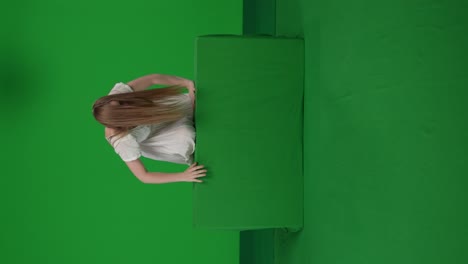 fullsize vertical green screen chroma key video of a posessed female woman figure ghost poltergeist