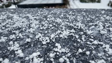 snow on a dark roof