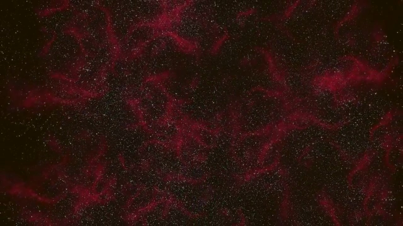 Radiant red nebula illuminated by nearby stars