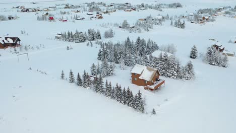 Aerial-drone-shot-of-Scenic-Alpine-Retreat-in-the-Heart-of-Utah's-Winter-Wonderland