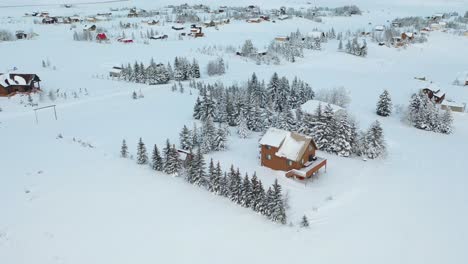 aerial drone shot of scenic alpine retreat in the heart of utah's winter wonderland