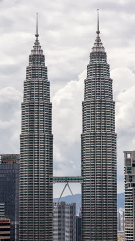 Kuala Lumpur petronas towers and skyline in vertical