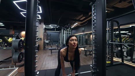 woman weightlifting in gym