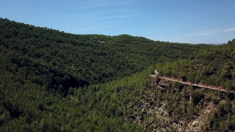 Aerial-view-of-Catalonian-mountains,-in-Parc-Naturel-de-Sant-Llorenc-del-Munt-i-L'Obac,-Spain,-Europe