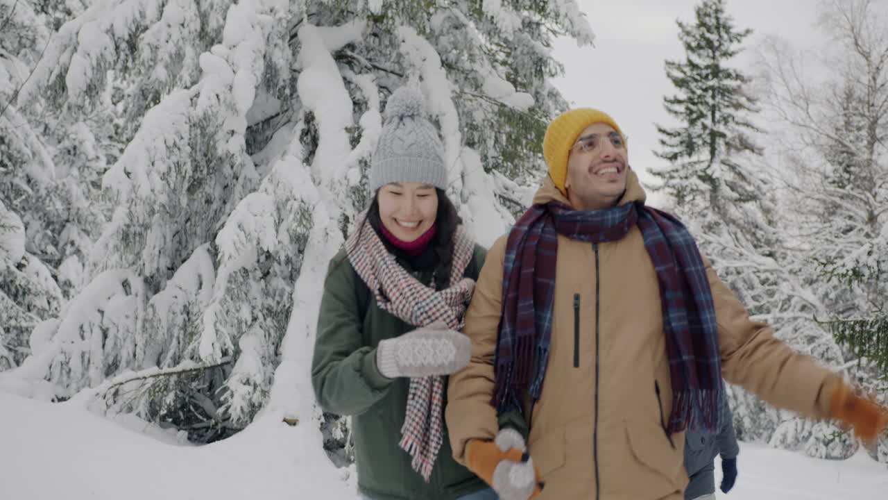 Friends enjoying a snowy winter hike