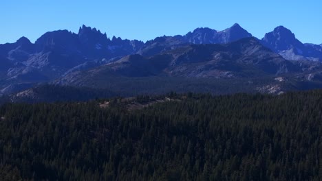 minarets vista california sierras banner peak volcanic ridge mammoth mountain lakes yosemite np aerial drone pct trail afternoon morning blue sky clouds nature landscape upwards motion