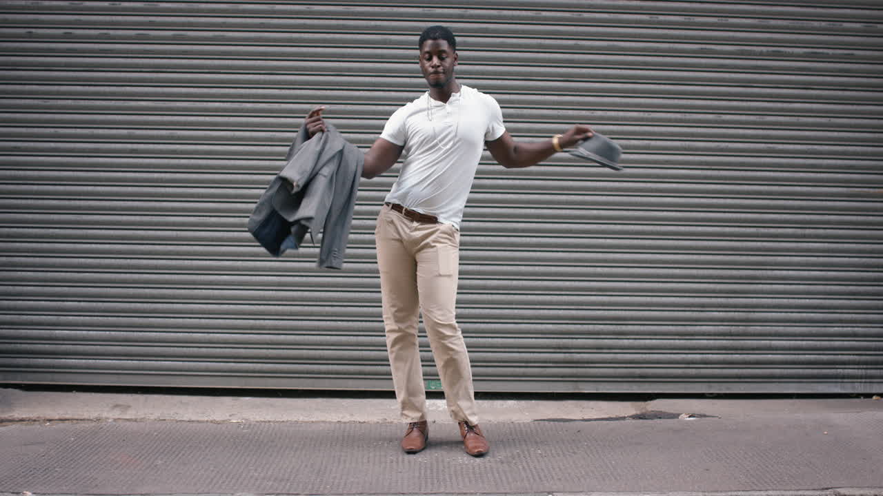 dance loop african american man dancing in street having fun celebrating with funny dance 4k