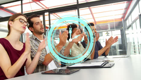 Animation-of-clock-over-diverse-male-and-female-business-colleagues-clapping-hands-in-office