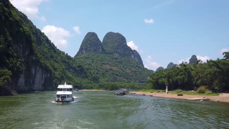 passenger tourist boat travelling on the magnificent li river from guilin to yangshuo