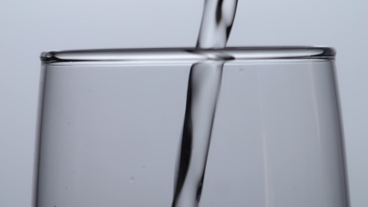 Water being poured into a glass