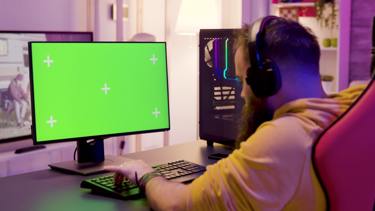 Gamer with Green Screen and Gaming PC