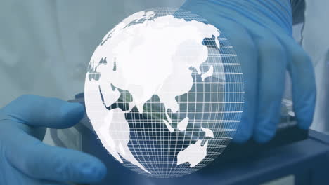 globe animation over hands in blue gloves handling scientific equipment