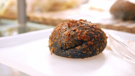 black  coconut bun on table ,