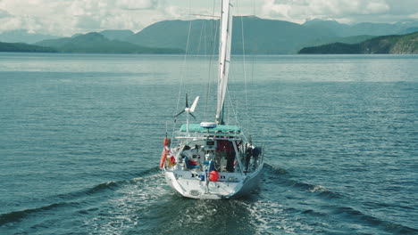 sailboat gliding through gentle water