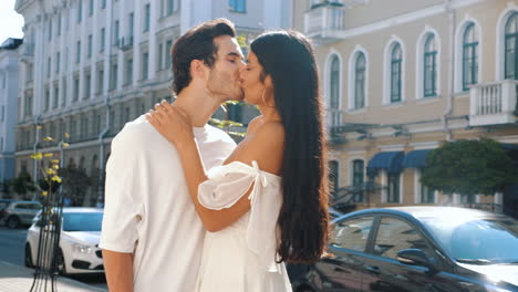 couple kissing on the street