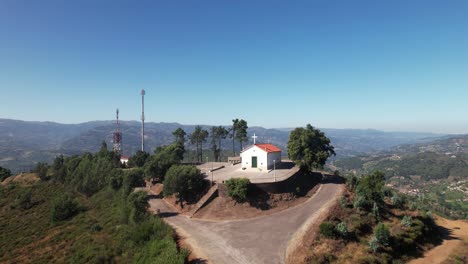 chapel on mountain top in portugal aerial view