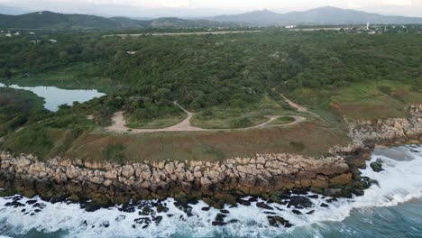 Puerto escondido Oaxaca Coastline aerial footage of sea ocean water waves in Mexico