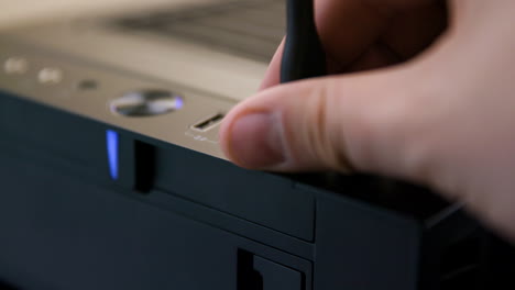 man unplugs cable from usb 3