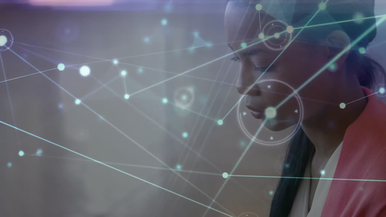 Animation of network of connections with light trails over diverse colleagues using tablets