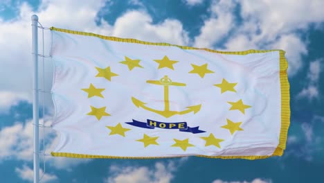rhode island flag on a flagpole waving in the wind, blue sky background
