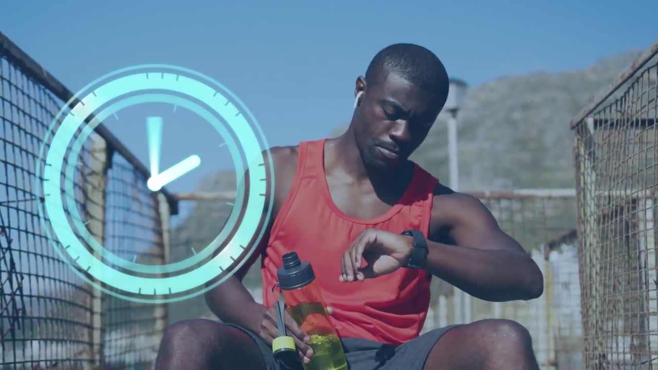 Animation of clock over african american man training in sun drinking water