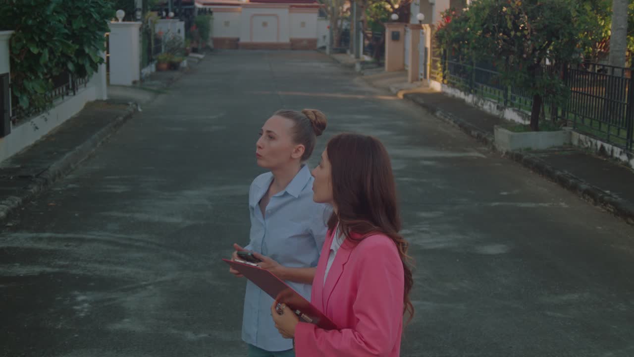 Real Estate Agents Inspecting Property