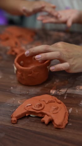 children making clay decorations