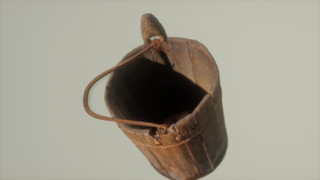 Old-used-rusted-wooden-bucket