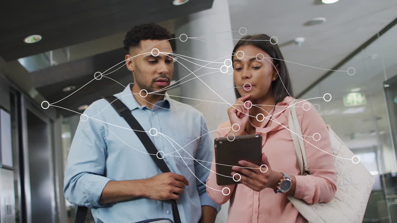 Animation of connections over diverse female and male coworkers using tablet