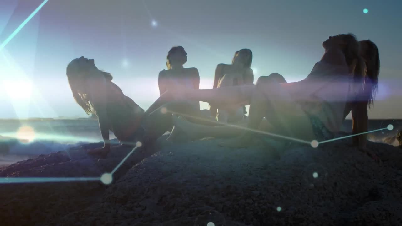 ⁇ 은 해변에서 웃고 있는 여성 친구들 위에 반 ⁇ 이는 커뮤니케이션 네트워크의 애니메이션