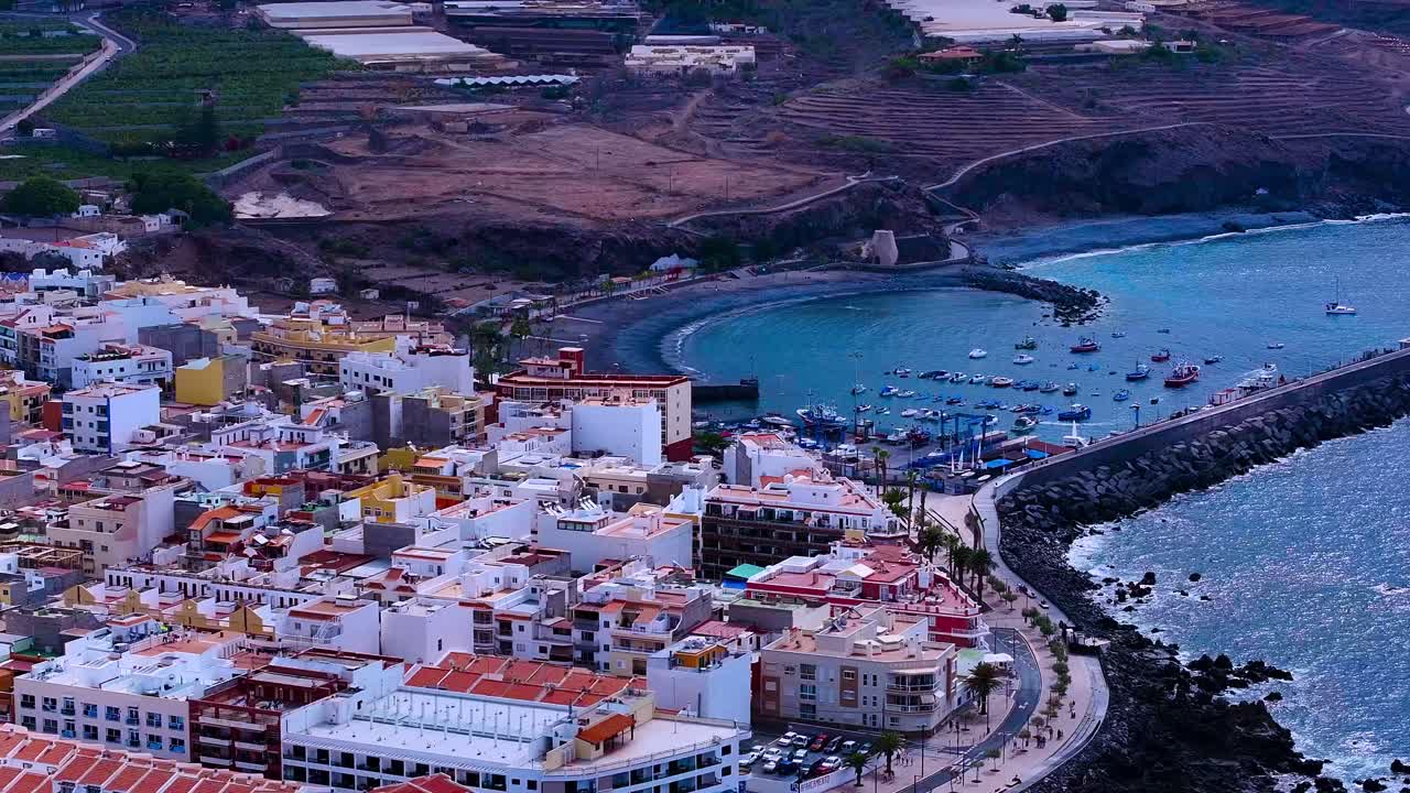 Playa san juan port and beach in tenerife, canary islands, aerial view