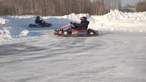 go-karting on an ice track in winter