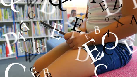 animación de letras que se mueven sobre los escolares utilizando la tableta