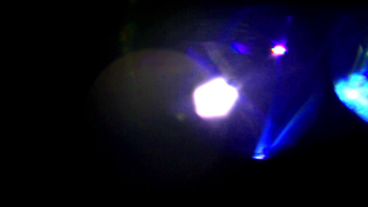 Abstract Light Leaks and Lens Flare Effects on Black Background