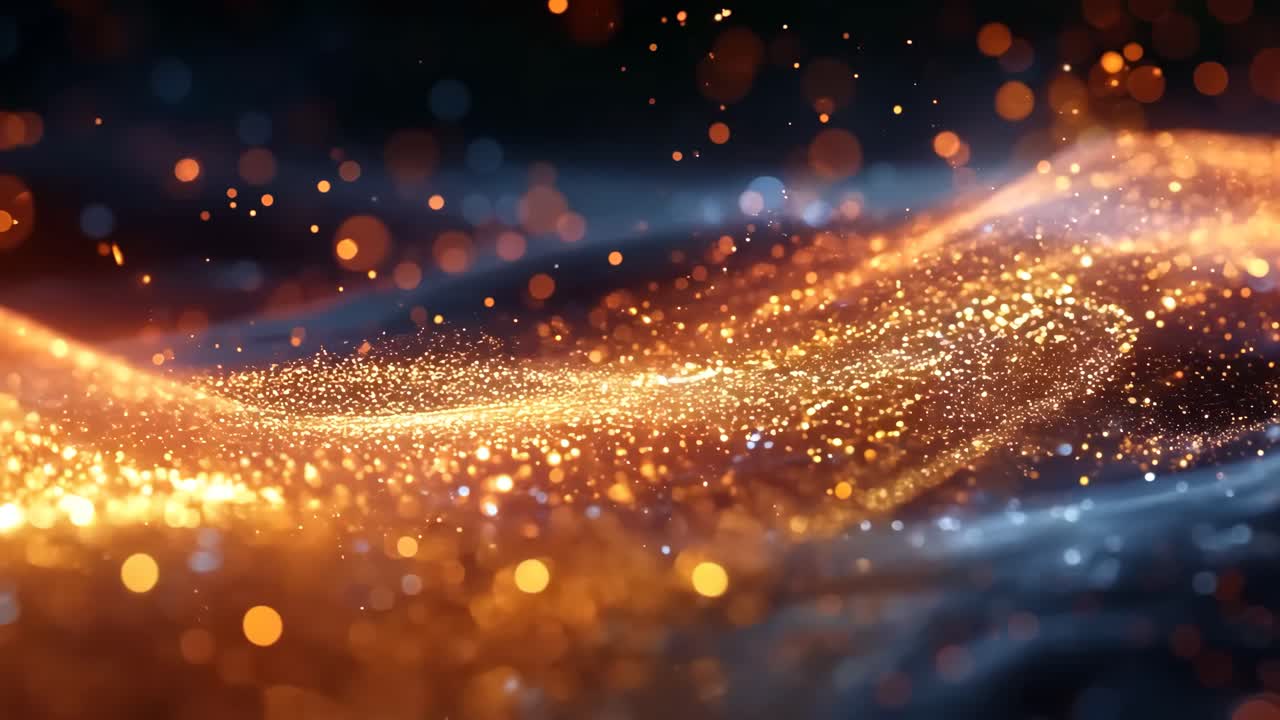 A bright orange line of sparkles in the dark blue background. The sparkles are scattered and seem to be moving in a wave-like pattern. The image has a dreamy, ethereal quality to it