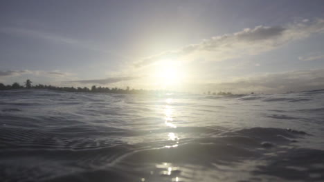 artistic underwater shot of sunset