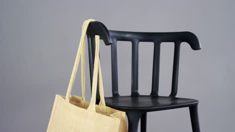 handbag hanging on a chair