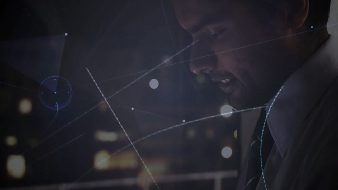 IT pro tapping tablet analyzing network data forming circles orbiting particles ending purple burst