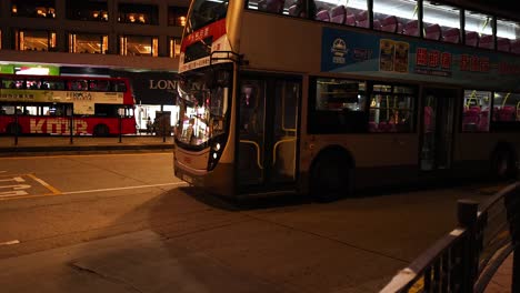 bus navigating through hong kong city traffic