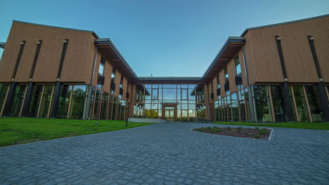 wide angle shot of a modern architecture building with glass and wooden elements