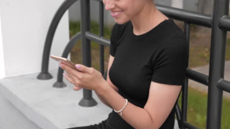 woman using a phone outdoors