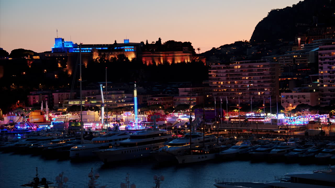 Aerial view of the Port Hercule Funfair in Monaco in the evening