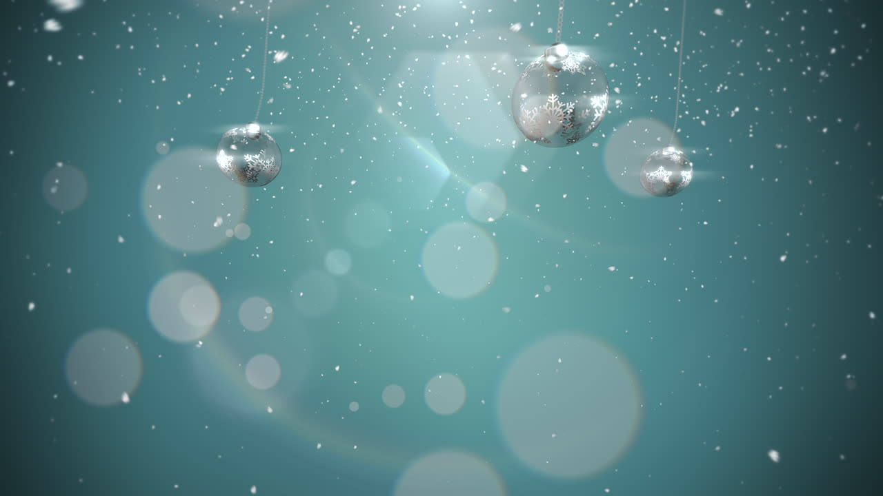 애니메이션된 근접 촬영 모션 실버 볼 및 파란색 배경에 눈송이