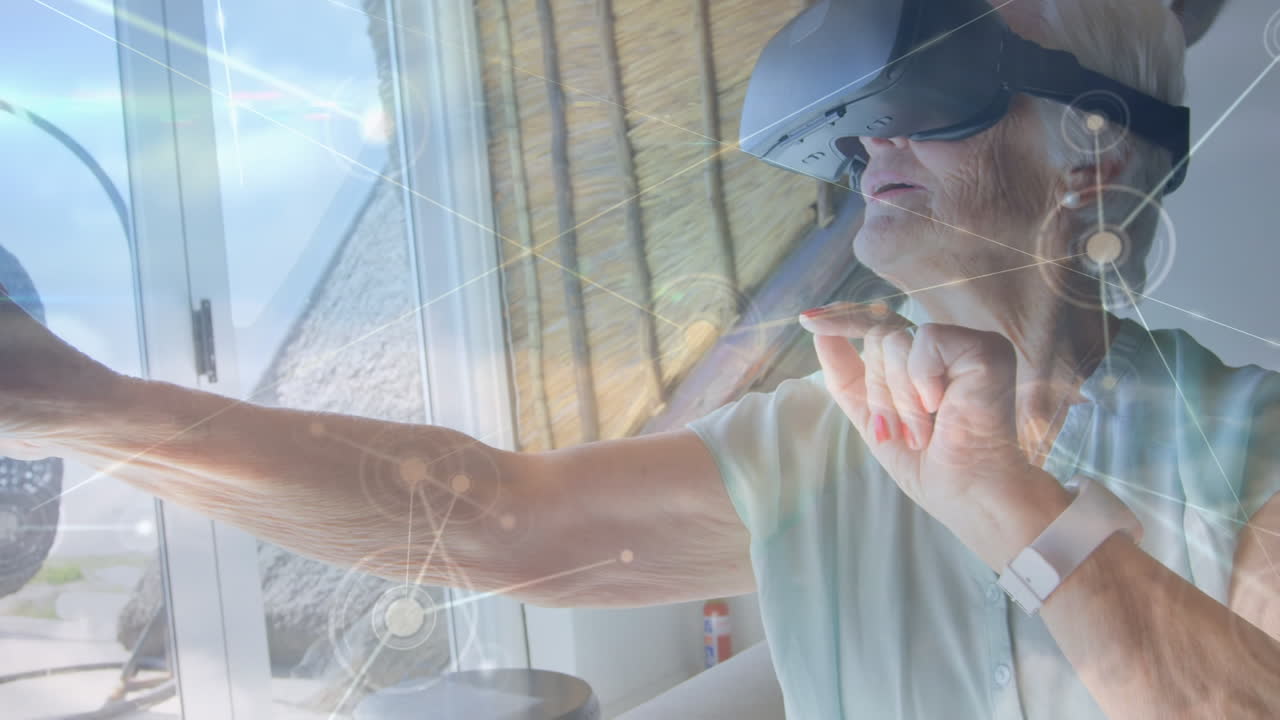 vr 헤드 ⁇ 을 착용한 백인 노인 여성에 대한 연결 네트워크의 애니메이션