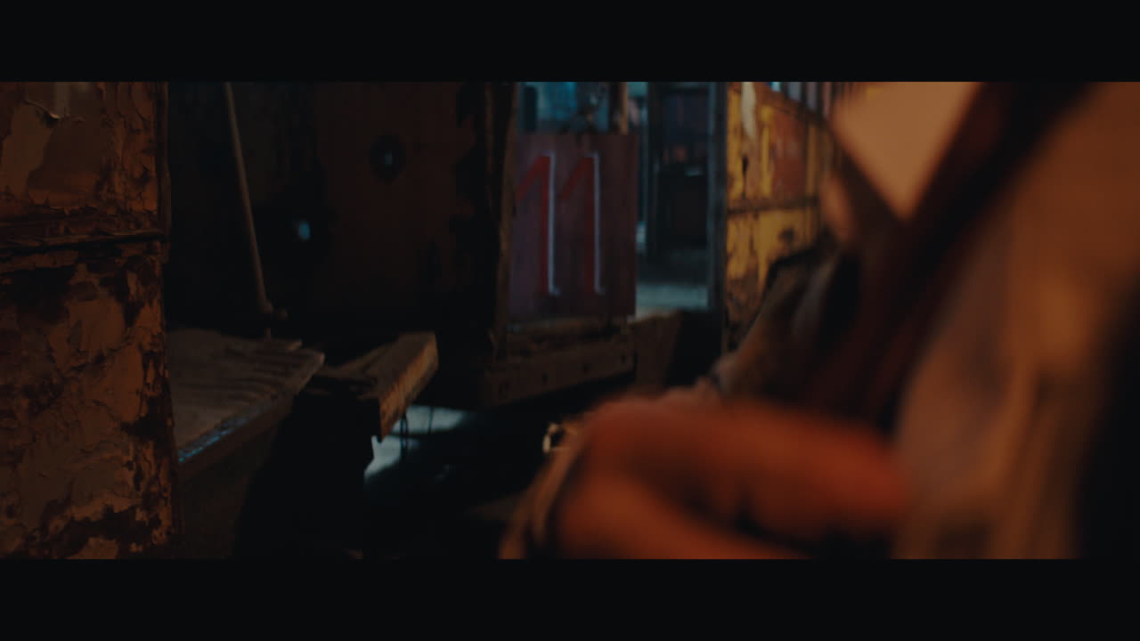 A man checks the clock in the circus camp